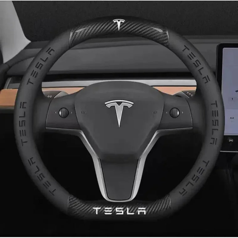 Tesla carbon fibre leather steering wheel cover, one of several Model 3 and Model Y interior upgrades
