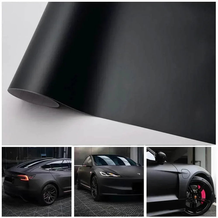 Roll of matte black vinyl wrap film laid out for a car colour-change project