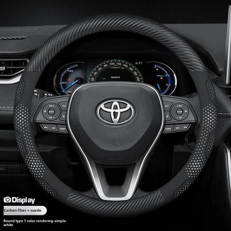 Toyota carbon fibre leather steering wheel cover fitted to a Corolla interior