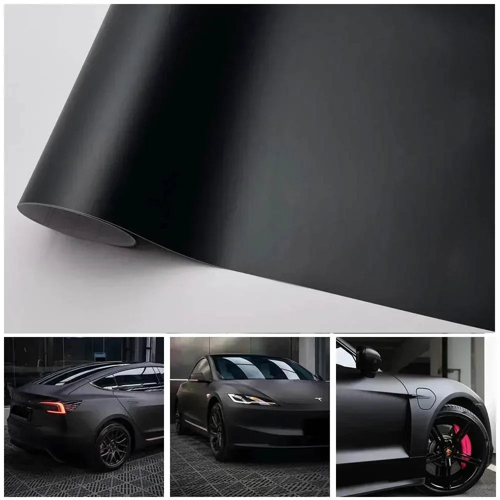 Roll of matte black vinyl wrap film laid out for a car colour-change project