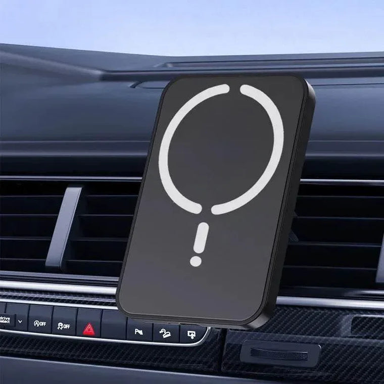 Wireless charging phone mount fitted to a car air vent