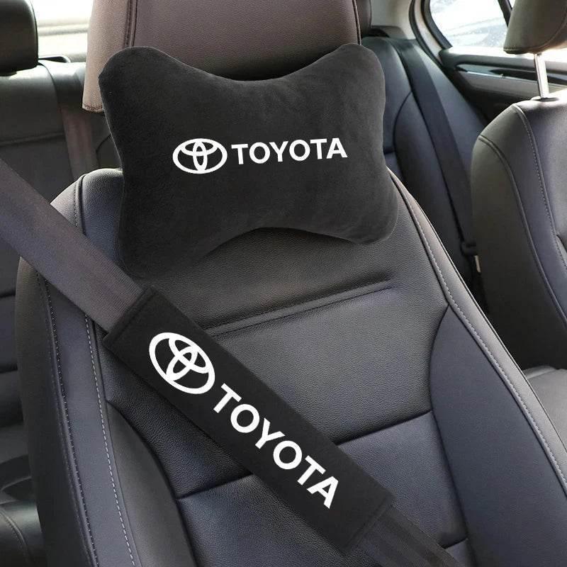 Toyota HiLux BEV accessories including neck pillow and seat belt pad set