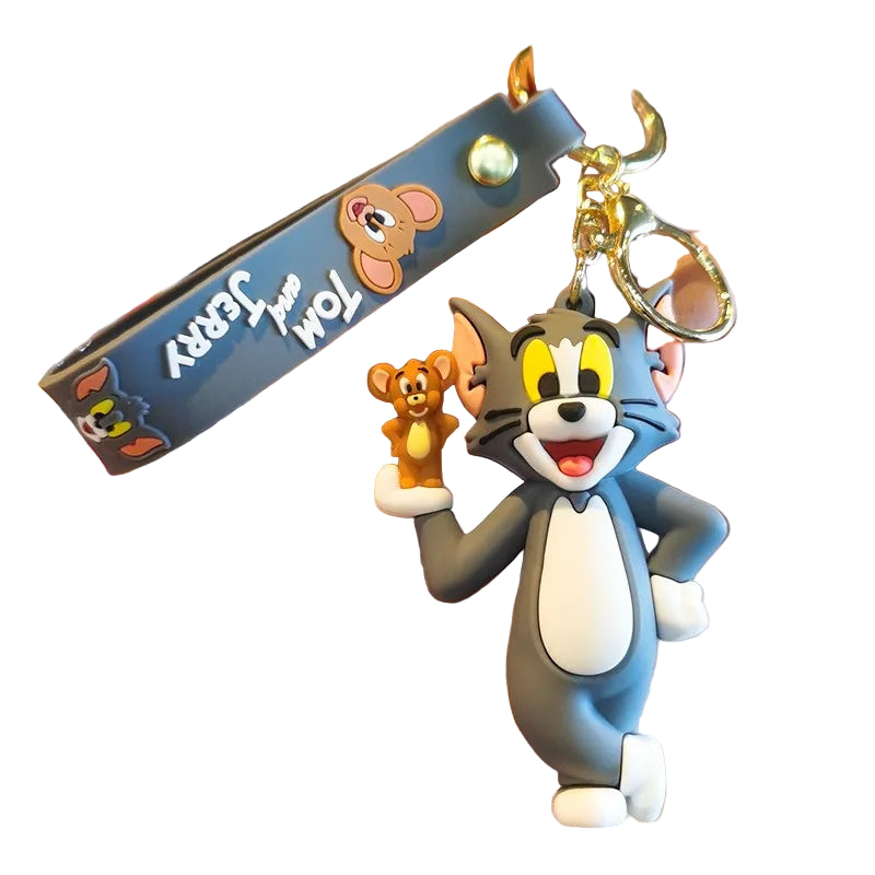 Keychain with cartoon character held in a hand, blurred background